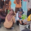 Polsek Panipahan Gelar Program Green Policing di SMP Negeri 1 Pasir Limau Kapas. ( Photo : Ilyas )